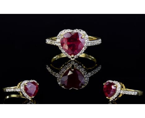 Ruby Solitaire and Natural White Zircon Heart Shape Ring, a 5ct heart cut ruby, of rich red colour, framed with 1ct of natura