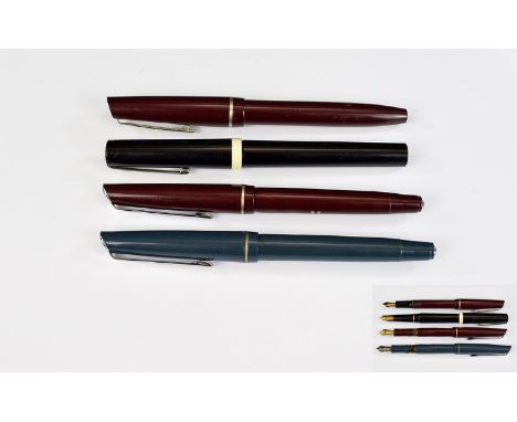 A Very Good Collection of Vintage Fountain Pens ( 4 ) Four In Total. Comprises 1/ Osmiroid B2 Italic Black Bakelite Cased Fou