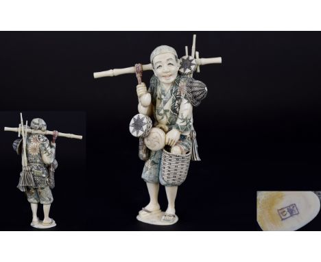 Japanese - Superb Quality Signed and Painted Late Meiji Period - Okimono Carved Ivory Figure of a Travelling Merchant Carryin