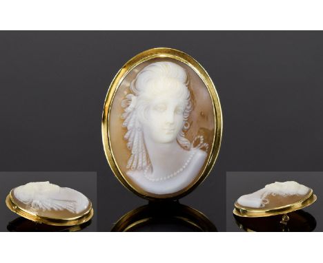 14ct Gold Mounted Oval Shaped Shell Cameo of Fine Quality. Features a Portrait Bust of a Young Woman, Wearing a Pearl Necklac