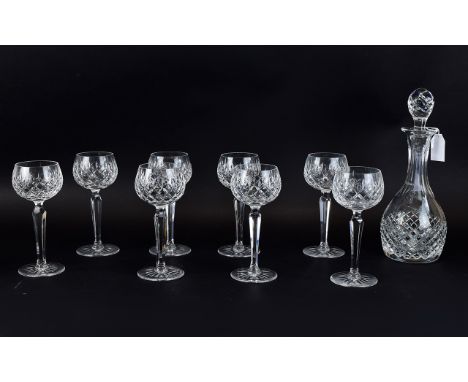 Cut Crystal Glass Decanter with star cut base 12 inches in height together with 6 crystal hock glasses also with star cut bas