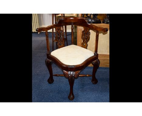 A 20th Century Chippendale Style Corner Chair  With acanthus carved ball and claw feet. 