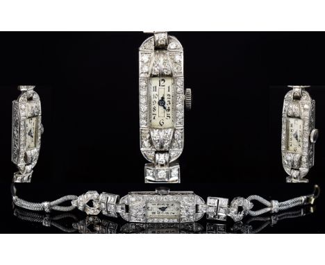 Ladies 9ct Gold Diamond Set Wrist Watch. White Metal Watch Case and Strap. Case Oblong In Shape and Pave Set with 32 Eight Cu