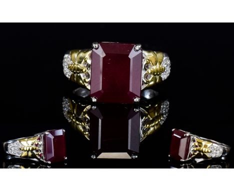 Ruby Octagon Solitaire and Shank Set Natural Zircon Accent Ring, a large, octagon cut ruby of over 9cts set in rhodium and go