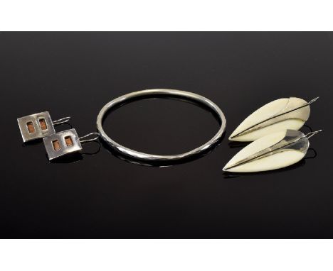 A Collection Of Mixed Silver And Ivory Vintage Jewellery To include hammered silver bangle, wired silver square earrings with