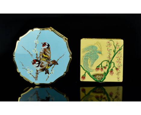 A Vintage Stratton Compact And Small Vogue Vanities Compact Circular gold tone compact with fluted edge and goldfinch pattern