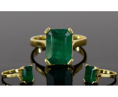 18ct Yellow Gold Set Handmade Single Stone Step-Cut Emerald Ring. The Columbian Emerald of Excellent Colour and Clarity. Size