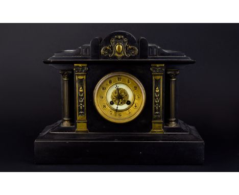 French Late 19thC Black Slate Mantle Clock maker Japy Freres. 8 day movement, striking on  gong with brass columns and mounts