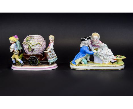 Two Meissen Style Figure Groups, one showing a very young couple in a romantic pose, the girl seated on a boudoir chair, with