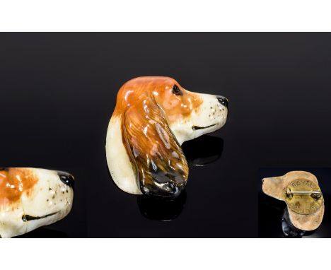 A Royal Doulton Ceramic Brooch In The Form Of A Cocker Spaniel A rare 1930's piece by Royal Doulton, fashioned in hand painte