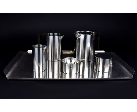 Stelton Danish Contemporary Tea Service comprising teapot, water jug, milk jug, tea strainer and sugar bowl.