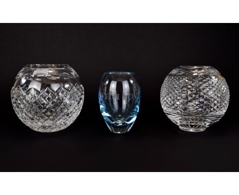 Two Glass Rose Bowls. One Brierley 7 inches in height, one Waterford with original box 7 inches in height both with star cut 