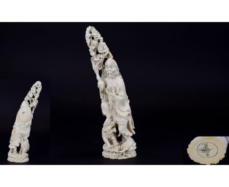 Chinese - Early 20th Century Carved Ivory Figure of an Immortal Mythical Figure with His Foot Subduing / Resting Upon a Mythi