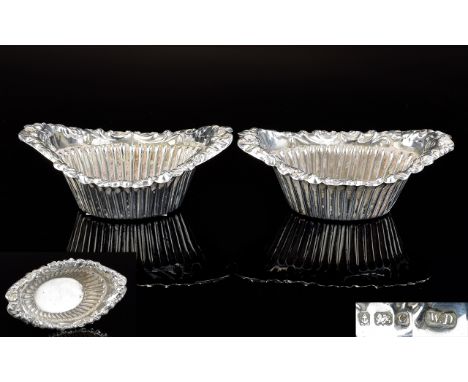 Pair of Silver Salts. Oval Silver Salts with Fancy Edge and Ribbed Bowl. Size 294mm x 261mm x 241mm. Sponsors Mark WD Hallmar