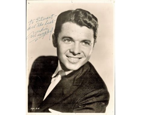 Audie Murphy signed 10x8 inch vintage black and white photo dedicated. Good condition. All autographs come with a Certificate