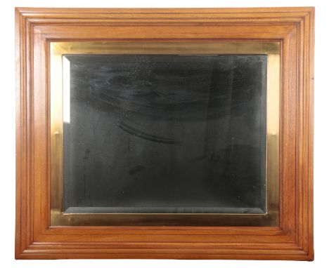 A CONTEMPORARY LIGHT OAK OVERMANTEL MIRROR BY RALPH LAURENthe rectangular bevelled plate within a gilt metal and moulded oak 