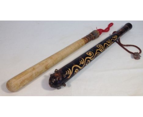 2 vintage French wooden truncheons.