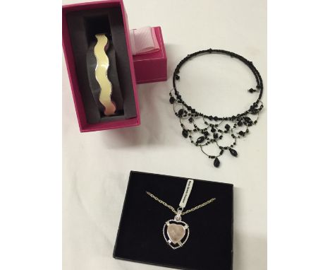 3 pieces of costume jewellery comprising a Rose Quartz pendant, cream wave shaped bangle and a black choker necklace.