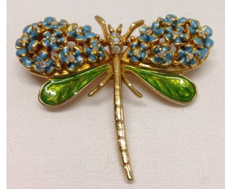 Pretty Kirks Folly dragonfly vintage brooch with enamelled wings set with diamante stones. Approx 2" long x 2" wide.