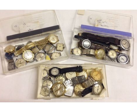 3 boxes containing 30-40 vintage Timex watches, some in working order, others for spares/repair.