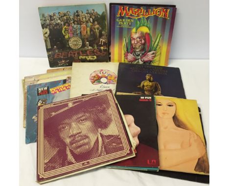 A box of vintage LP records to include the Beatles, Queen, Elton John, Cat Stevens, etc.