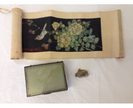 An early 20th century Jade cigarette/trinket box with carved lid, a Japanese silk wall hanging with bird decoration and a car