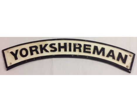 A reproduction cast iron 'Yorkshireman' curved steam engine name plate, 65cm long.