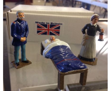 An Errol John Studios boxed US Union Hospital ACW Vignette comprising officer, nurse, and patient in bed. White metal soldier