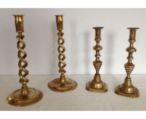 2 pairs of vintage brass candlesticks.