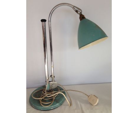 A vintage Bestlite adjustable lamp with pale blue base and shade