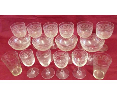 16 Edwardian glasses all with matching engraved decoration. Includes 4 champagne saucers.
