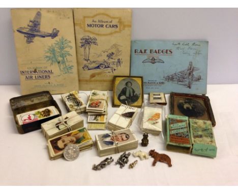 A collection of antique/vintage items including Victorian photo frames & white metal charms, together with a quantity of old 