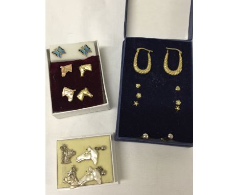 10 pairs of earrings to include 9ct gold hoops, studs, horses heads and enamel butterfly.