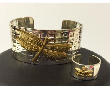 A 925 silver bangle and ring with raised gilt dragonfly decoration.