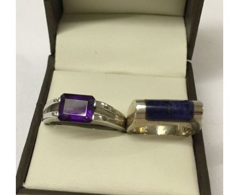 2 silver ladies ring. One set with amethyst size S, the other set with Lapis Lazuli size K.