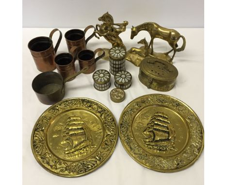 A box of copper and brass metalware to include a horse & foal figure, a huntsman on a rearing horse, a casket, 3 brass & moth