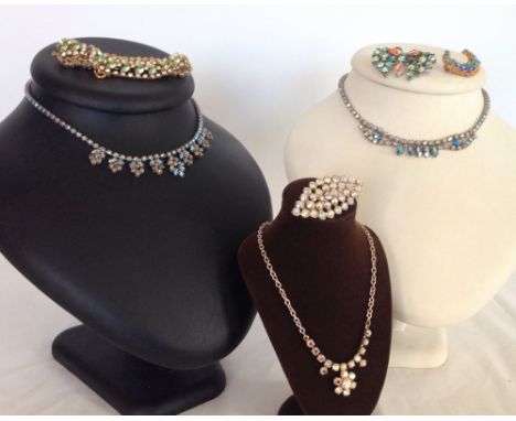 3 vintage evening necklaces together with accompanying brooches and a bangle. All set with diamante stones