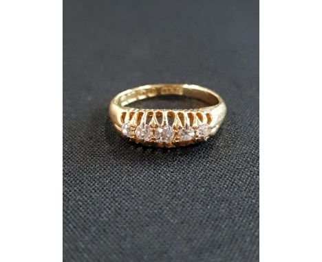 18 CARAT GOLD AND DIAMOND 5 STONE RING