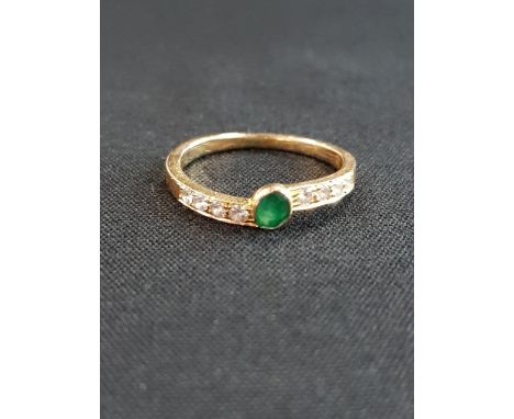 18 CARAT GOLD EMERALD AND DIAMOND RING