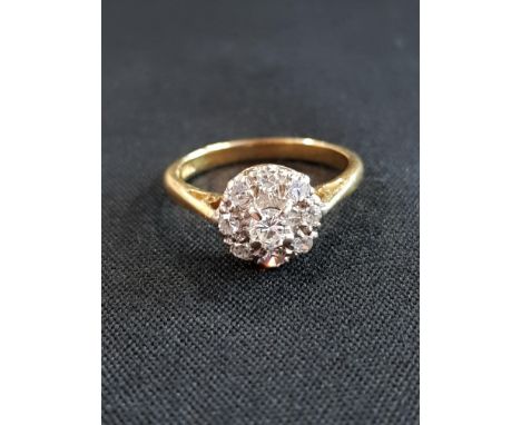 18 CARAT GOLD AND DIAMOND CLUSTER RING WITH CIRCA 0.33 CARAT OF DIAMONDS