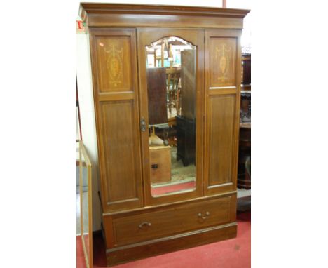 An Edwardian walnut, chequer strung and further floral satinwood inlaid single mirror door wardrobe, having single long lower