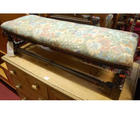 A 19th century oak framed and floral tapestry upholstered twin footstool 