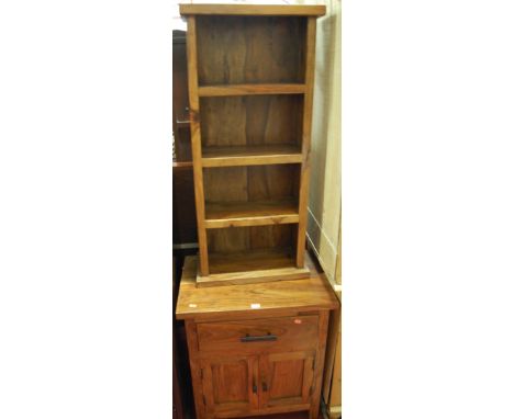 A contemporary Eastern hardwood double door bedside cupboard, having single upper drawer; together with a narrow open shelf (