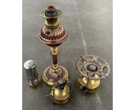 Large paraffin lamp, two Primus stoves and a miners lamp