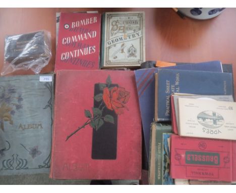 Two post card albums, Vintage Meccanno magazines and assorted books