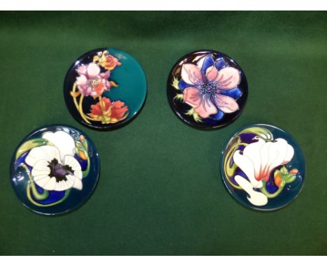 Four modern Moorcroft pottery tubelined trinket dishes (3 boxed)