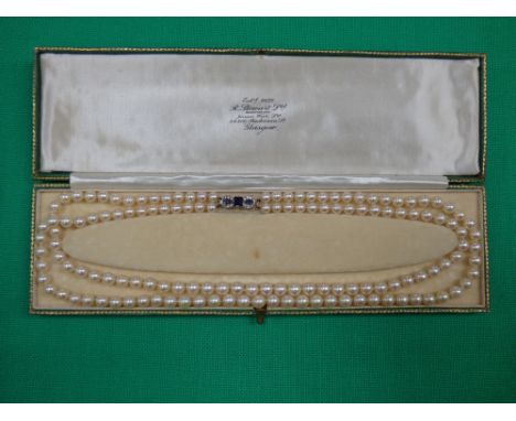Two strand pearl necklace, with diamond and saphire clasp, approx overall length is 50cm, Provenance: vendors grandparents wh