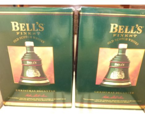 Cased set of 6 Bells Old Scotch Whiskey decanters Christmas 1993 and a similar cased set of three Christmas 1994, all boxed