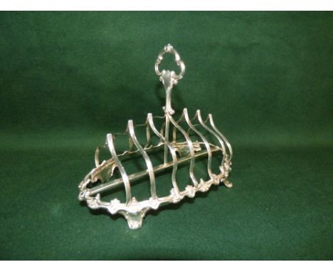 Early Victorian oval silver toast rack, ornate frame on splayed feet 20 cm by Henry Wilkinson & Co.  Sheffield 1847,  9 ozt