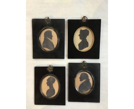 J H Gillespie (1793-c.1838)A group of four oval silhouette portraits, in ebonized frames, with printed backing paper, 13 x 10